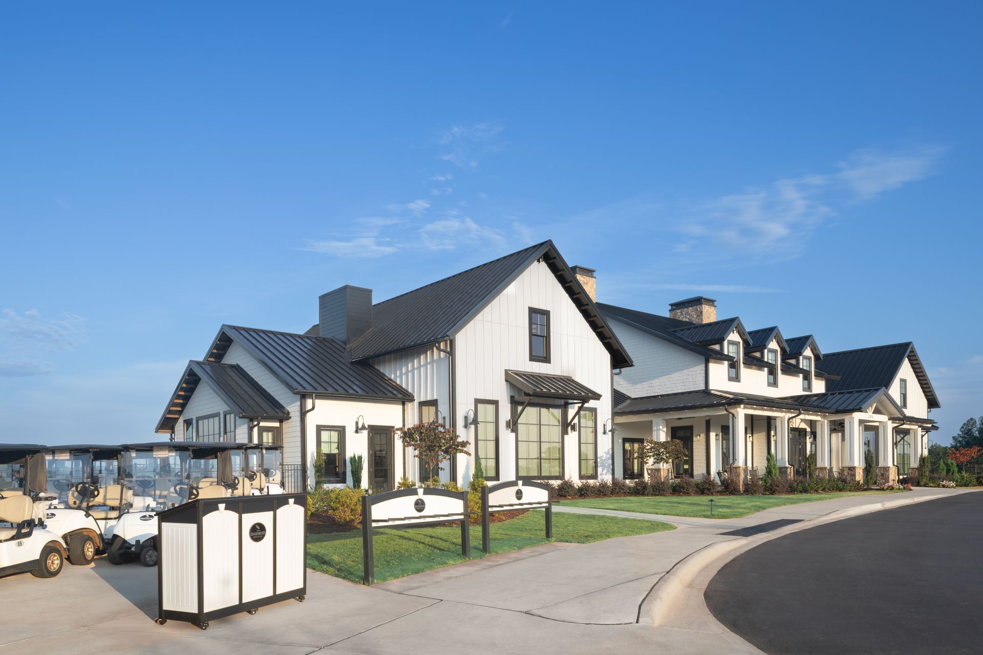 Edgewater Village Center with golf carts and modern farmhouse architecture